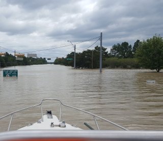 Boat overlooks flooding following Hurricane Harvey in Houston, Texas
