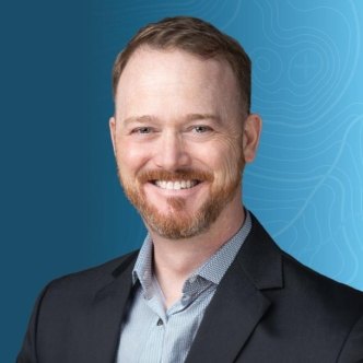 headshot of Eric Myers on a blue topographic background
