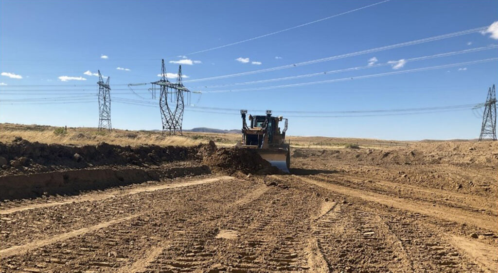 Overview of dozer excavation (cutting slope) along western margin of WY terminal through northeastern extension