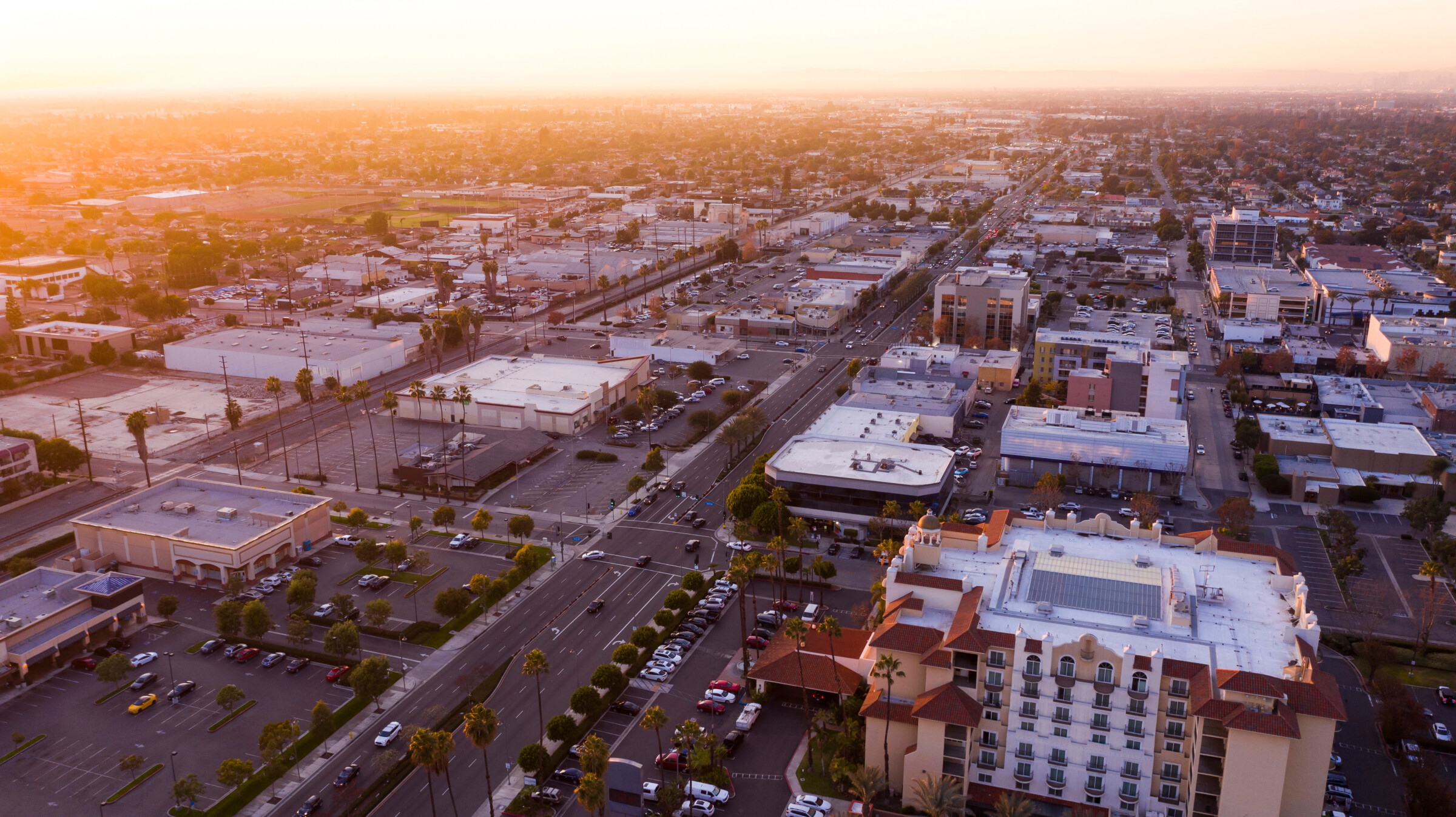 Sunset aerial view of downtown Downey, California, USA.