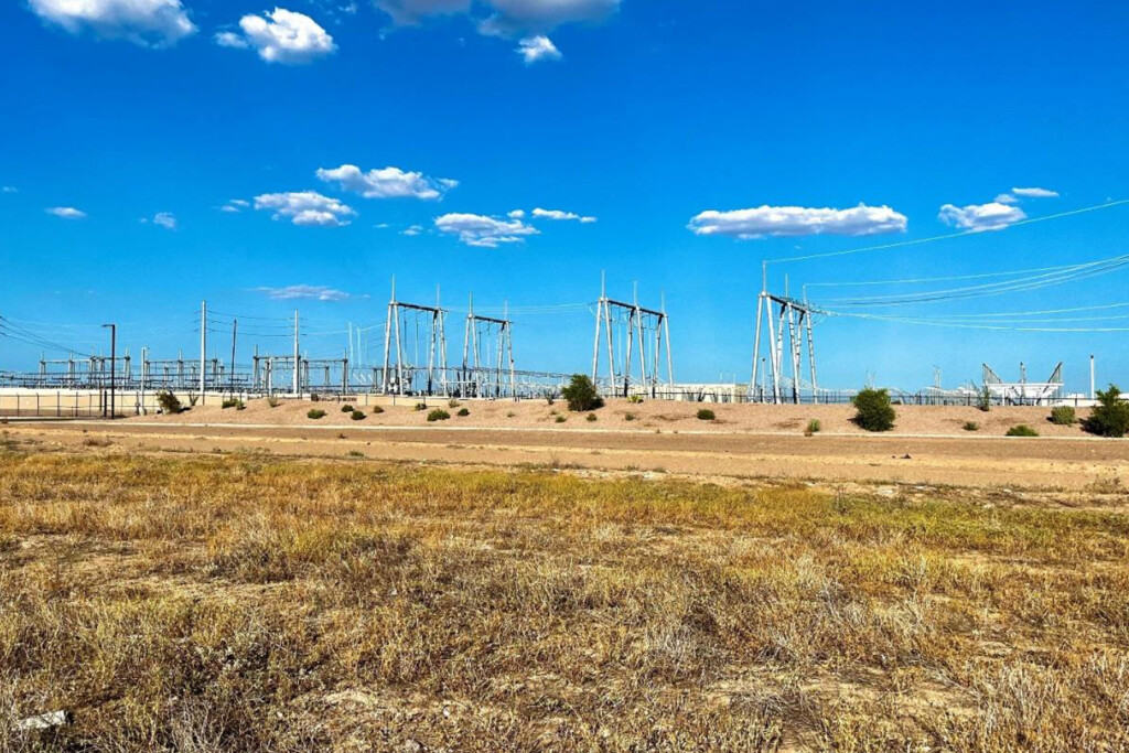 Exhibit G-4. Photograph of the existing Runway Substation; view from the southwest corner of the Microsoft data center parcel, facing northeast.