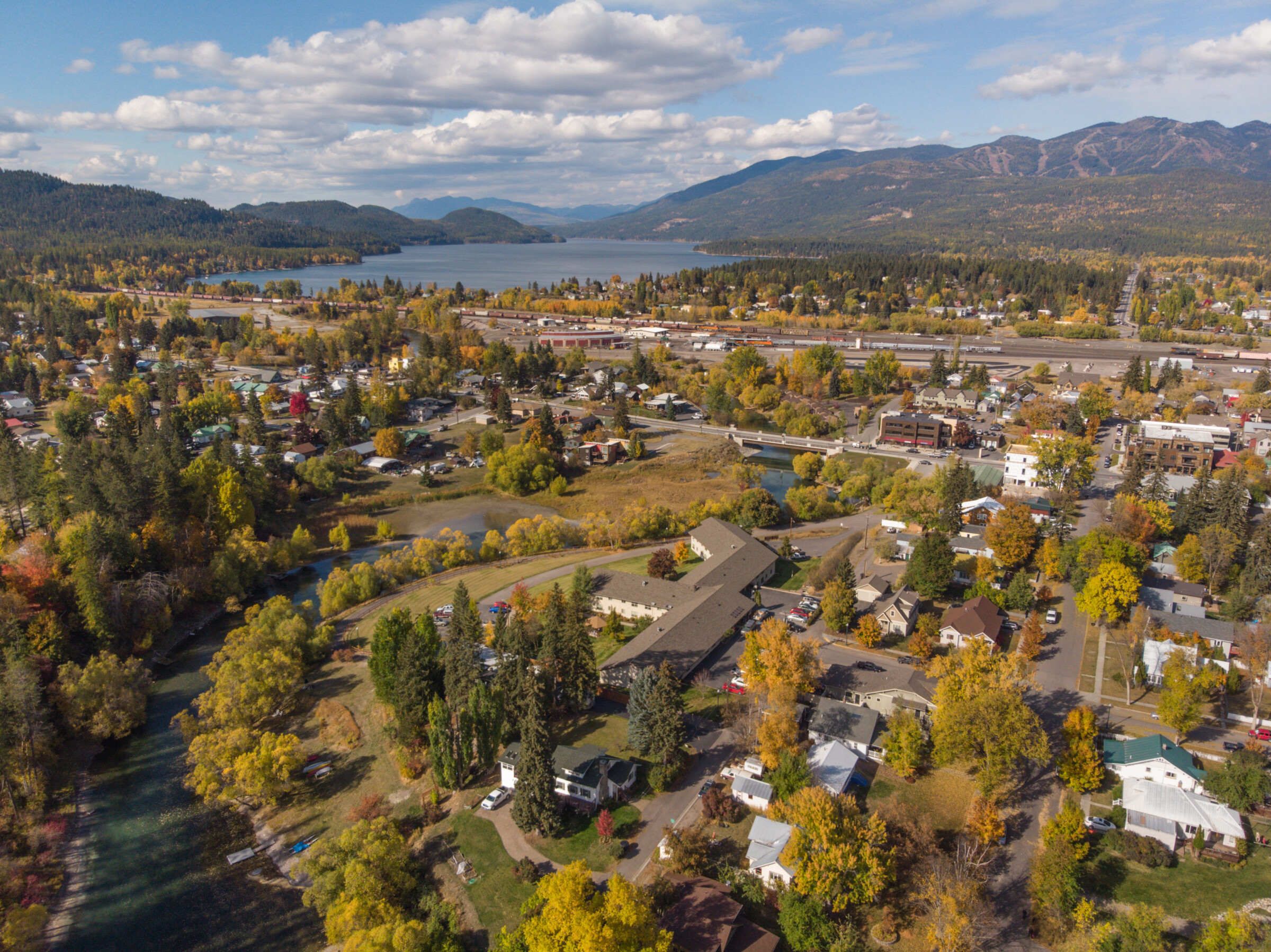 Birds eye view of fall colors surrounding the town of Whitefish Montana