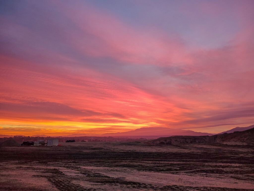A sunset in a desert.