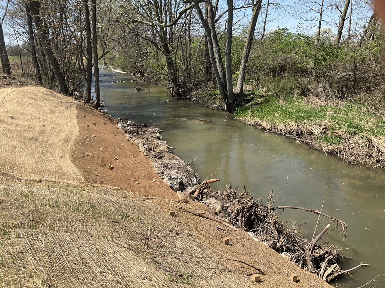 a regraded bank is shown alongside Packer Creek. 
